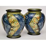 Pair of Doulton, Lambeth stoneware jars,