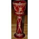 A Minton Secessionist jardiniere on stand, with red ground and stylised foliate design, Rd. No.