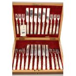 A Victorian matched set of twelve fruit knives and twelve forks, mostly by Henry Atkin,