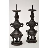 Pair of Japanese bronze pricket candlesticks, of graduated bulbous form,