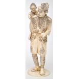 Carved Japanese part ivory figure of a man with child on his back,