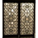 Two 19th Century leaded glass stained windows, decorated with acorns and oak leaves,