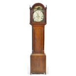 A 19th Century oak thirty hour longcase clock, the painted dial with roman numerals,