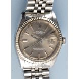 Rolex Oyster Perpetual Datejust: a gentleman's stainless steel wristwatch, baton dial fluted bezel,