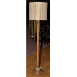 Robert 'Mouseman' Thompson of Kilburn: an oak standard lamp,