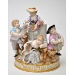 Meissen pastoral group of children, modelled in the round with girl leaning on a column,