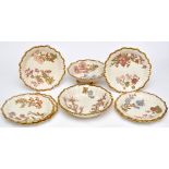 Royal Worcester ivory ground eight-piece dessert service, comprising: six plates, bowl and comport,