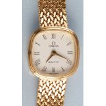 Omega: a lady's 9ct. gold quartz wristwatch, shaped square roman dial on flexible 9ct.