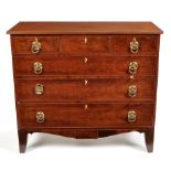 A George III mahogany chest of three short and three graduated drawers,