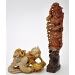 Two Chinese soapstone carvings, one of Buddhist lions playing with a ball, length 11cms,