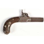 An early 19th Century percussion pistol,