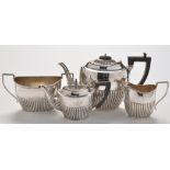 An Edwardian matched three piece tea service, by Joseph Gloster and William Henry Sparrow,