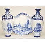 Pair of blue and white Royal Crown Derby 'Marine' vases, painted with fishing vessels at sea,