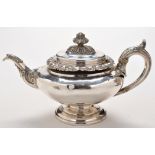 A William IV teapot, by James McKay, Edinburgh 1830, circular with vine pattern rim,