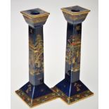 Pair of Carlton ware blue ground chinoiserie candlesticks,