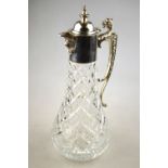 A hobnail-cut glass claret jug with silv