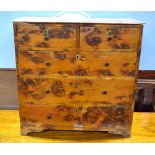 A 19th century burr-yew miniature chest of two short over three long graduated drawers having