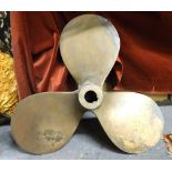 A bronze boat's propeller with three foils,