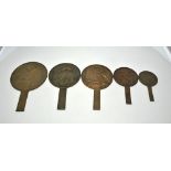 A graduated set of eight Japanese bronze mirrors, early 20th century, 16.7 cm - 34.