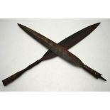 Two African Asegai - wrought iron tribal spear-heads of traditional double-edged form,