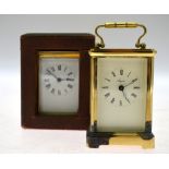 A brass carriage clock,