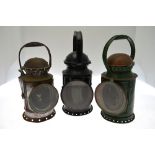 A railway signalling hand lamp stamped GWR, with three aspect rotary drum red, green,