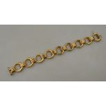 A 9ct yellow gold hollow circular linked bracelet to/w 9ct white gold ring set with cubic