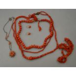 A row of graduated coral beads to/w double row coral beads, row of stick coral, carved coral