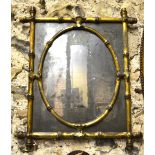 A Regency giltwood faux bamboo framed wall mirror with heavily patinated silvered plate,