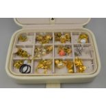 A jewel box containing various items of vintage and later jewellery including Monet rings, brooches,
