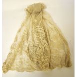 A c.1900s needle-run lace wedding veil, a deep tape lace collar, a smaller foliate lace collar, pair