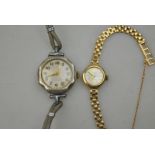 A lady's 9ct gold Rotary wristwatch with 21 jewel movement and silvered dial, on brick-link