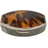 A silver trinket box of tonneau form with tortoiseshell inset cover, E. S. Barnsley & Co.