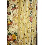 A pair of lined and inter-lined glazed cotton curtains with pale yellow/white striped ground with