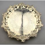 An early Victorian silver letter salver with cast shell and scroll border and engraved decoration,