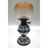 A Meissen onion pattern oil lamp base with etched glass shade Condition Report Rather grubby, no