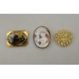 A rectangular yellow metal brooch set with oval moss agate to/w seed pearl scroll brooch,