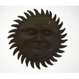 A West African wrought iron tribal sun mask,