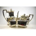 A late Victorian silver four-piece tea/coffee service of rectangular form with concave canted