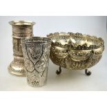 An Indian low-grade metal bowl with pierced rim, richly chased and embossed with fish,