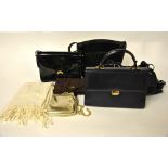 Three boxes containing a collection of sixteen designer leather, snakeskin and other handbags,