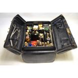 A black morocco leather doctor's bag, the fitted interior complete with medical instruments,