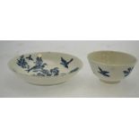 A First Period Worcester  blue and white porcelain tea bowl and saucer decorated with birds in a