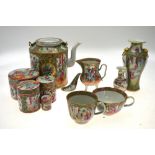 A selection of Cantonese porcelain wares, including teapot, four cylindrical pots and covers,