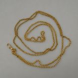 A reeded yellow gold guard chain fitted with swivel approx 52g,