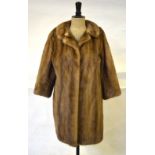 A shadowed taupe mink fur coat with neat rounded collar, retailed by Maxwell Croft, London, 52 cm