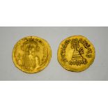 Two Byzantine coins: gold Solidus.