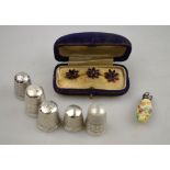 Five various silver thimbles,