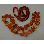 A row of baroque amber beads,