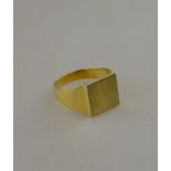A 9ct yellow gold signet ring with matt head,